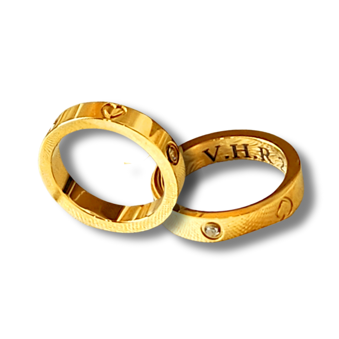 Heart and zircon couple rings