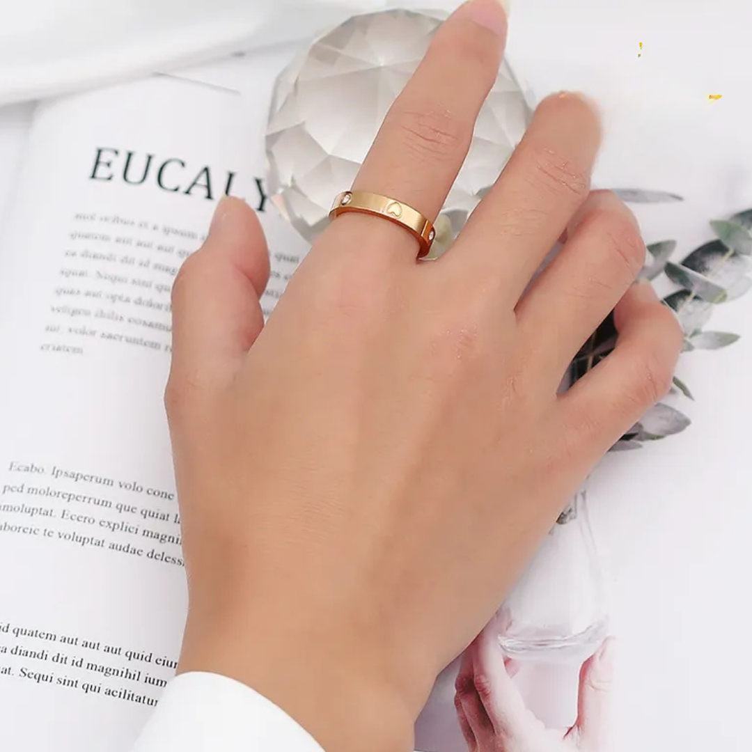 Heart and zircon couple rings