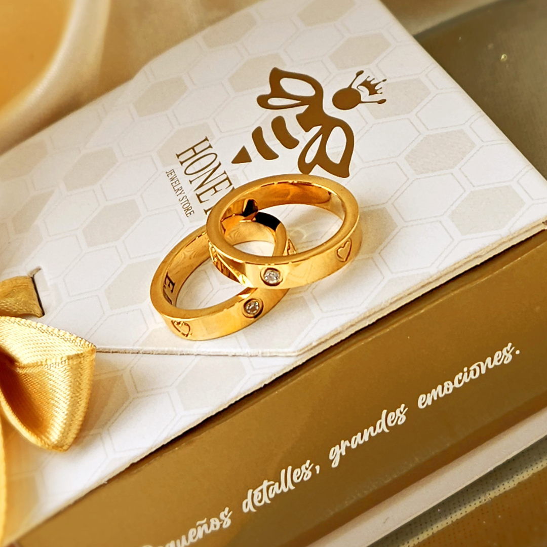 Heart and zircon couple rings