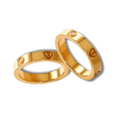 Heart and zircon couple rings