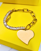 Bracelet with baguette zircons and heart pendant