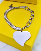 Bracelet with baguette zircons and heart pendant