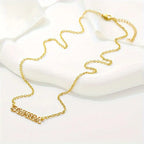 COLLAR NOMBRE CALADO