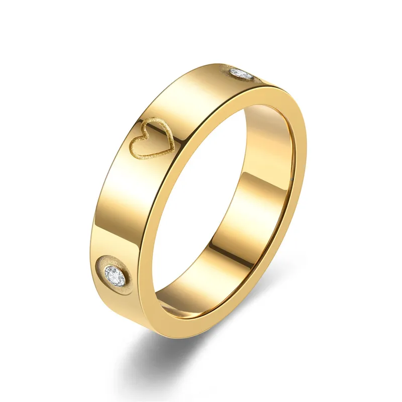 Heart and zircon couple rings