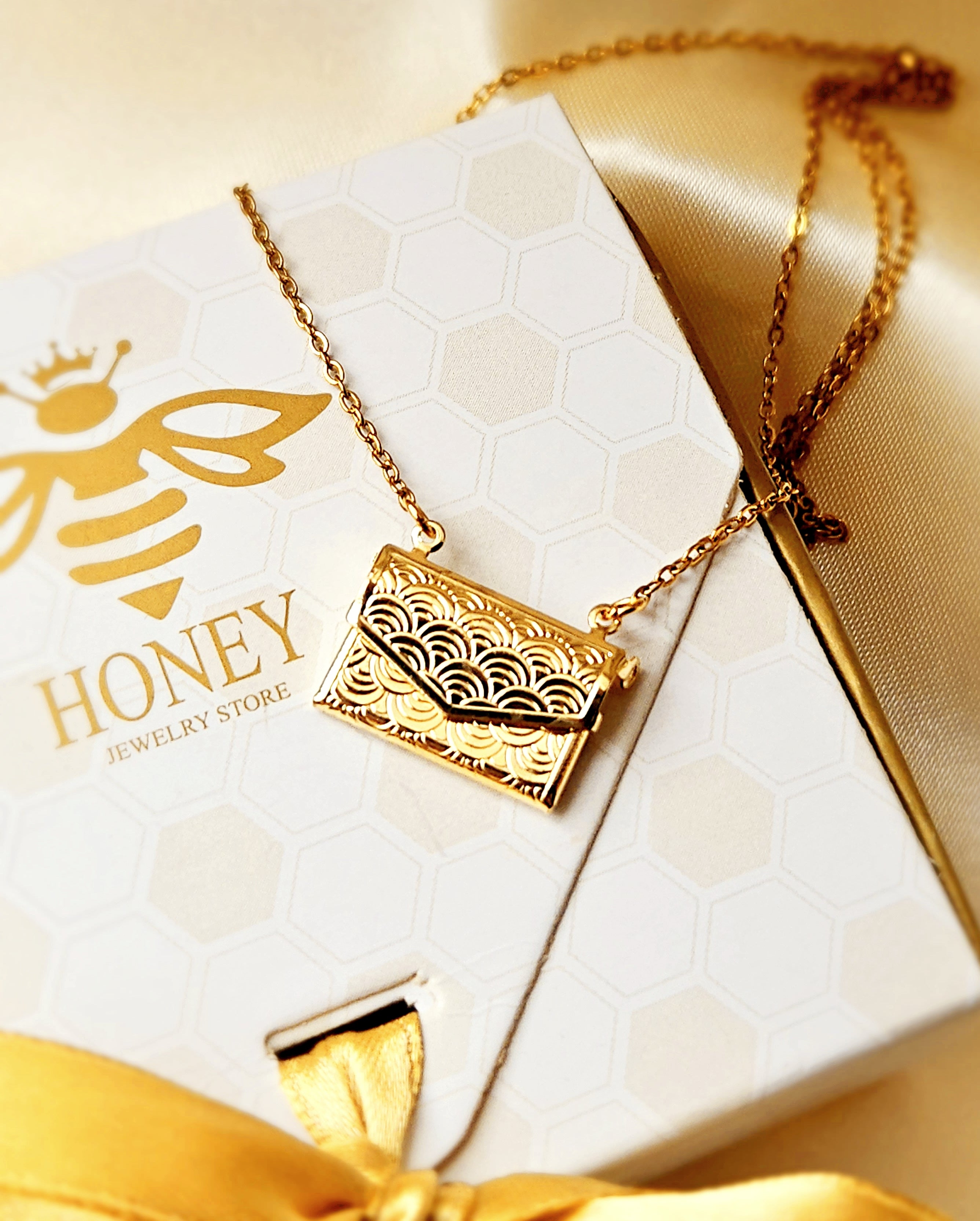 Embossed love letter necklace