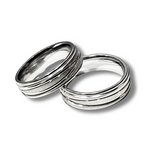 Couple ring with shiny and matte intertwined lines