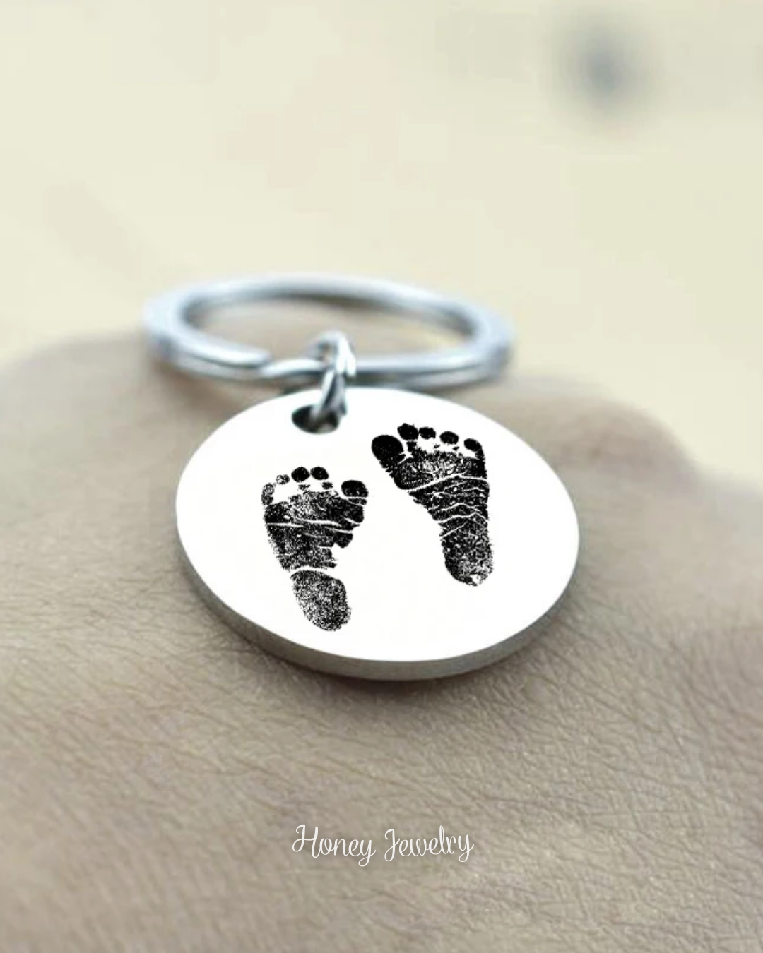 Round plate keychain with baby footprints