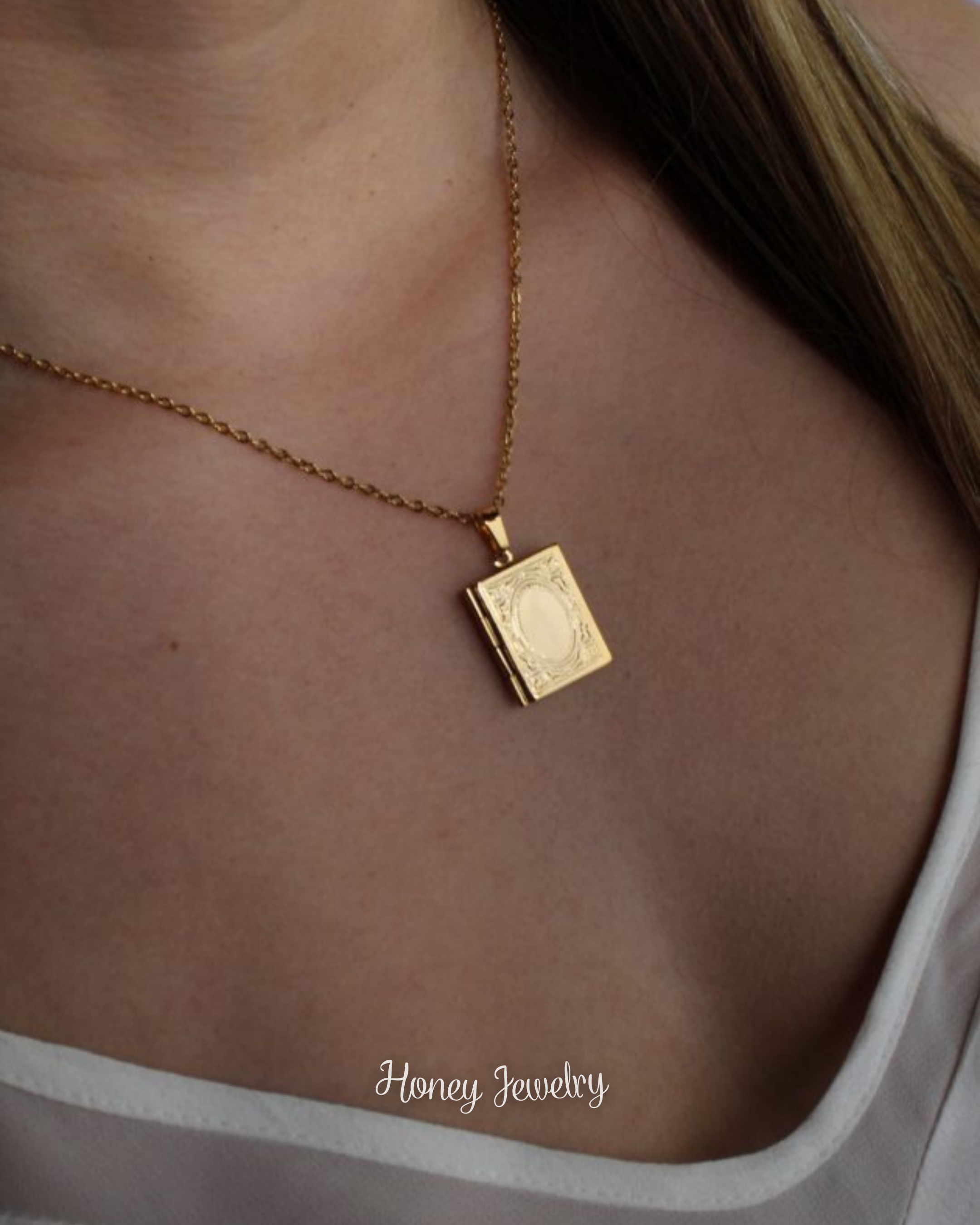 Book locket necklace with border