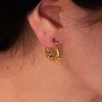 aretes corazón entrelazado